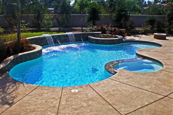 Pool spa stamped concrete raised planter