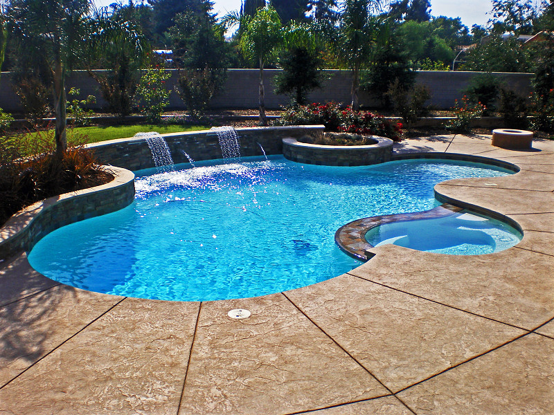 Pool spa stamped concrete raised planter